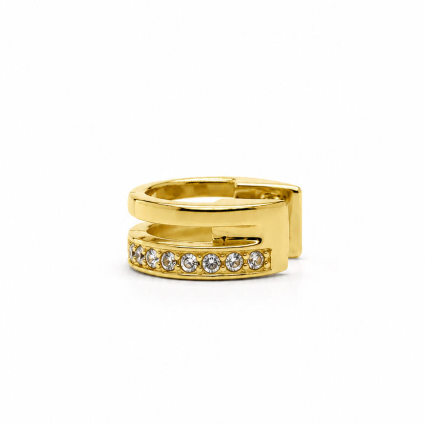 a gold hair cuff on white background